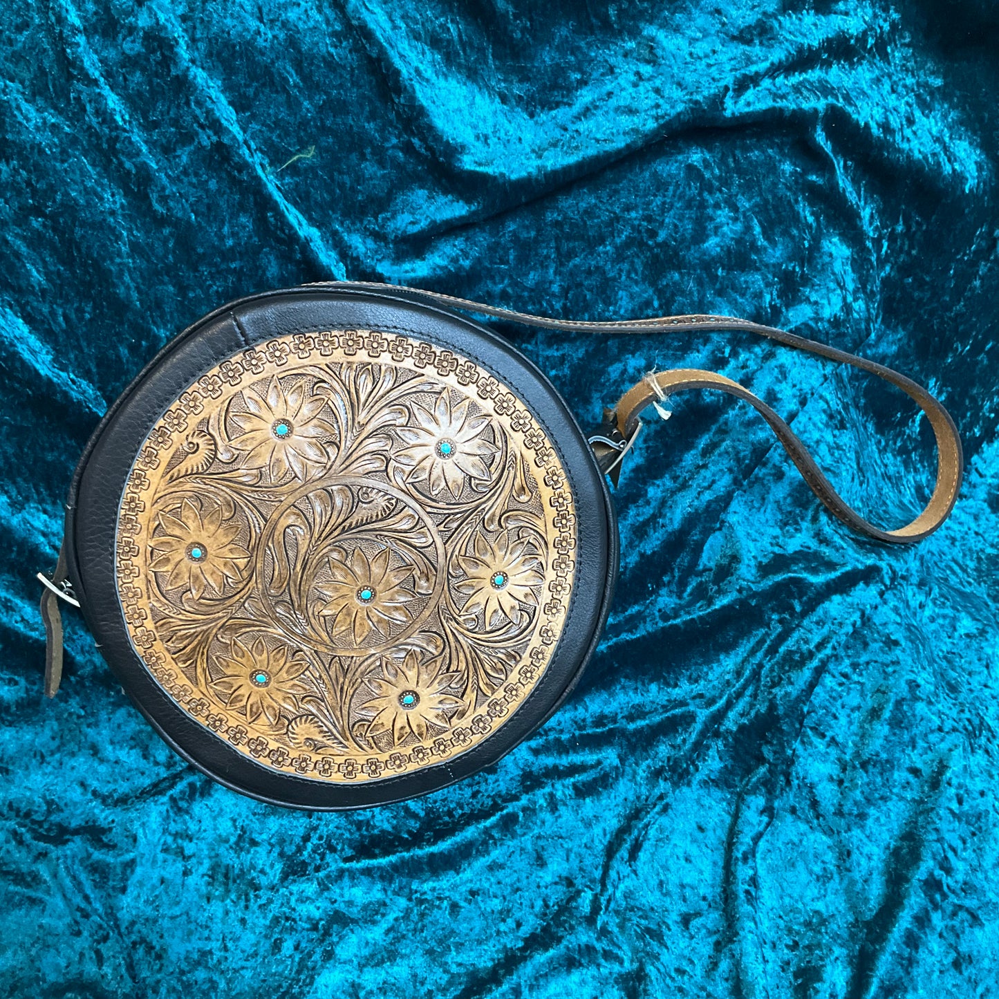 Round tooled/hide handbag