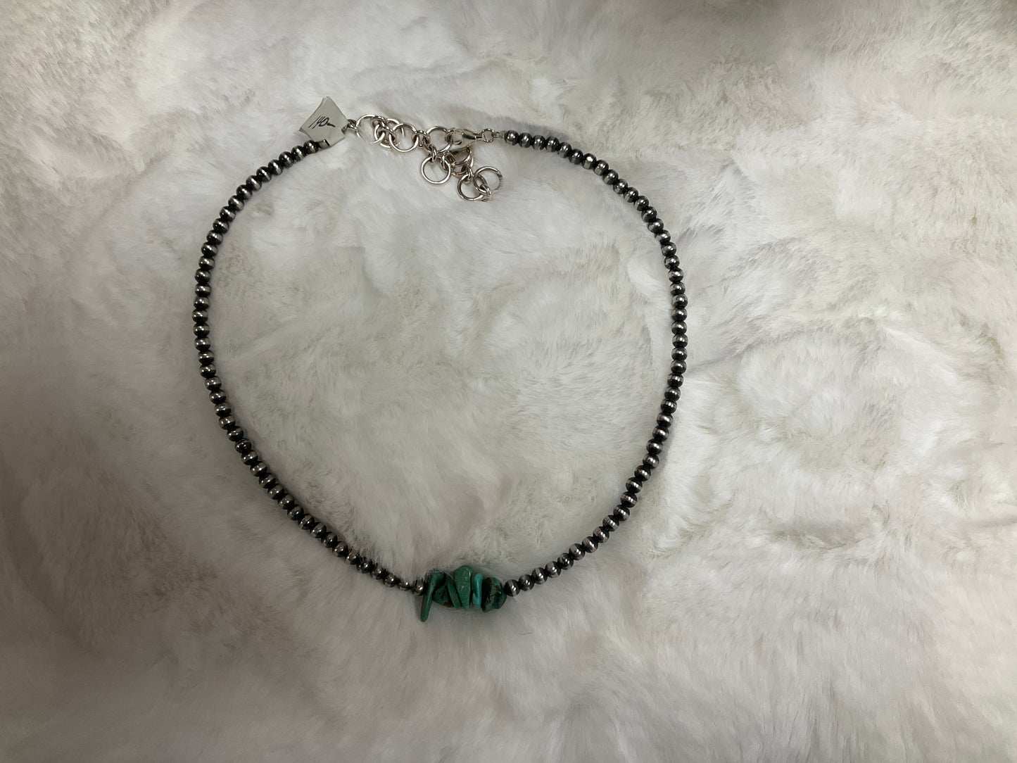 Navajo pearls w/ turquoise stone in center